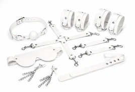 Набор Feral Feelings BDSM Kit 7 White, наручники, поножи, коннектор, маска, паддл, кляп, зажимы